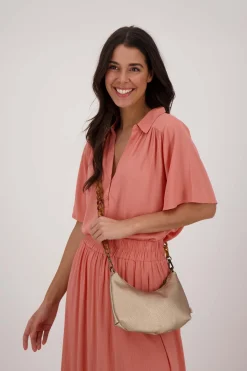 zusss schoudertasje met hornen hengsel goud