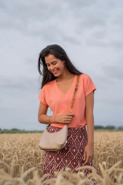 zusss schoudertasje met hornen hengsel goud