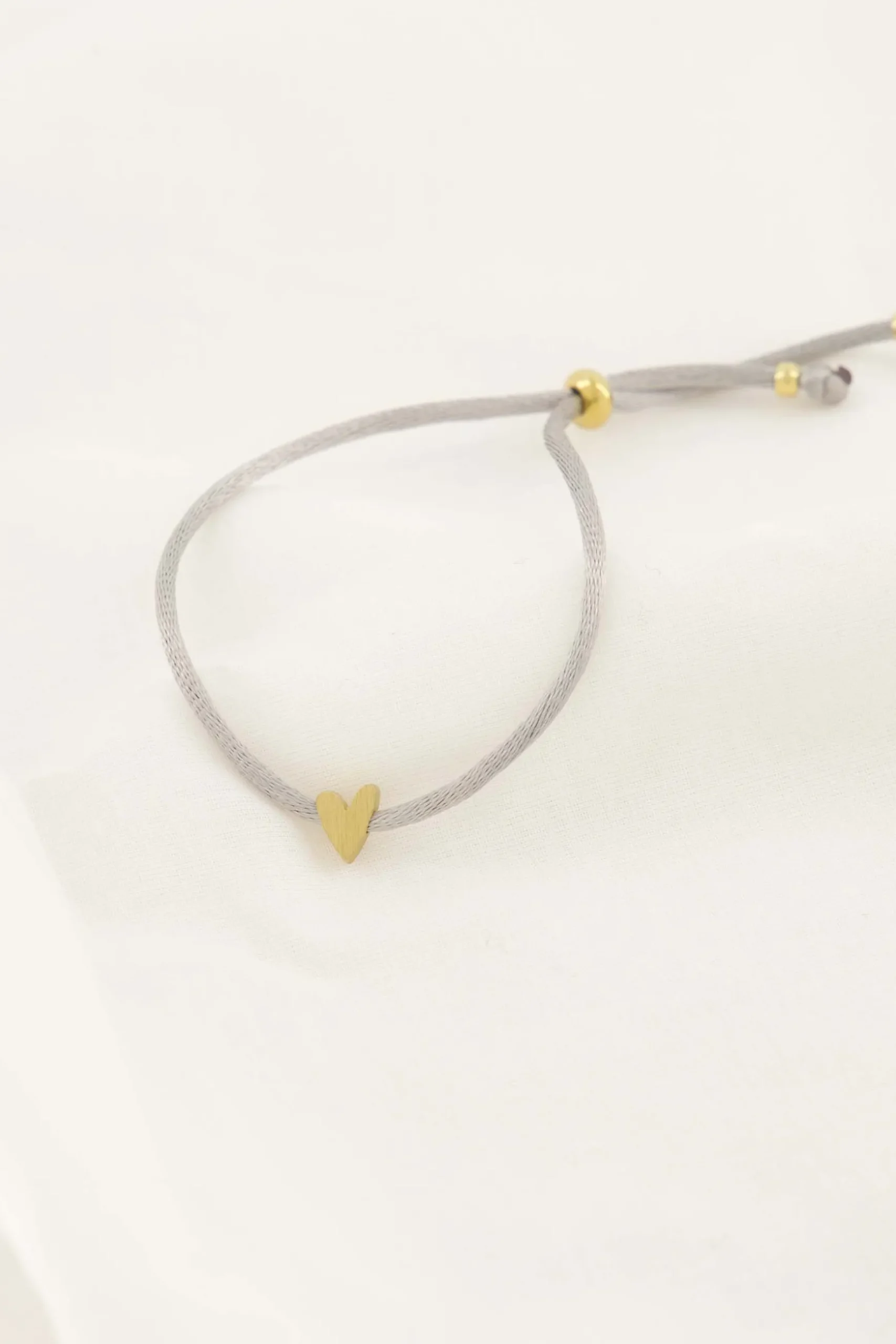 zusss touwarmbandje hartje zand